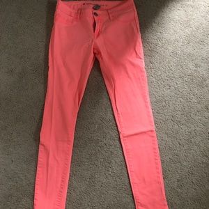 Neon pink skinny jeans